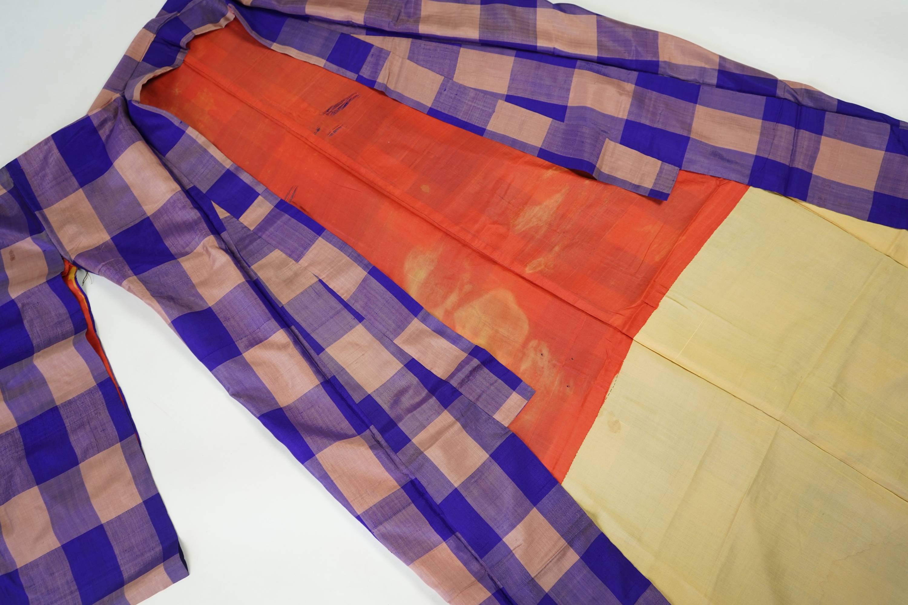 Four 1930’s - 1950’s printed silk full length silk lined Japanese kimonos. Two floral and two geometric in design. Longest black and orange floral designed kimono, 150cm long. Condition - purple and pink check kimono the